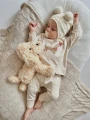 Pluszowy piesek Maltipoo 35 cm jako prezent na narodziny dziecka