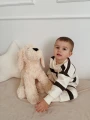 Duży piesek pluszowy Maltipoo jako przytulanka dla dziecka